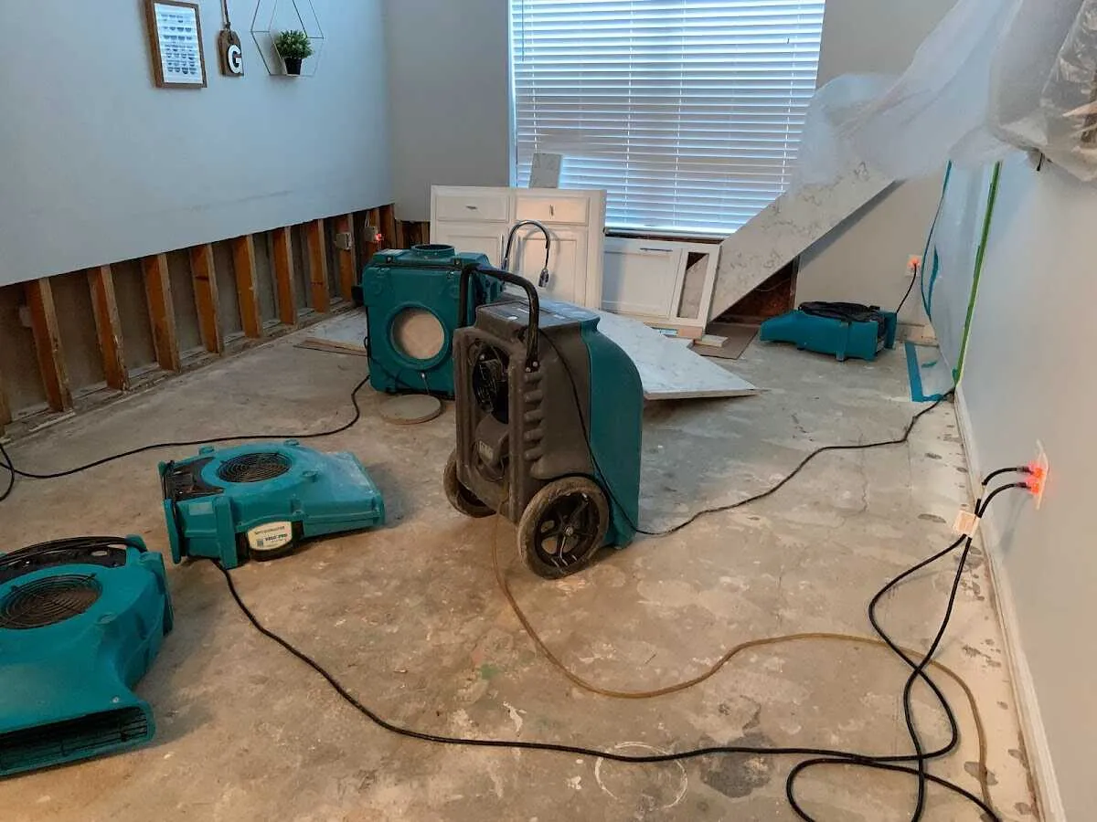 Dehumidifier in flood-cut room for Water Damage Restoration in Hollis